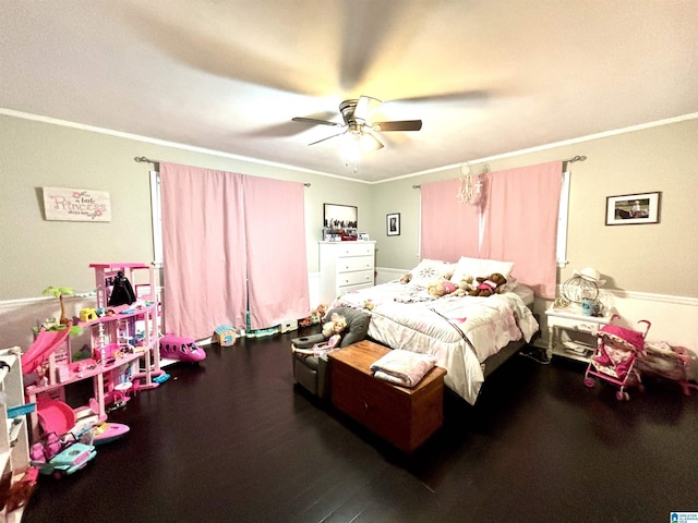 bedroom with ceiling fan and crown molding