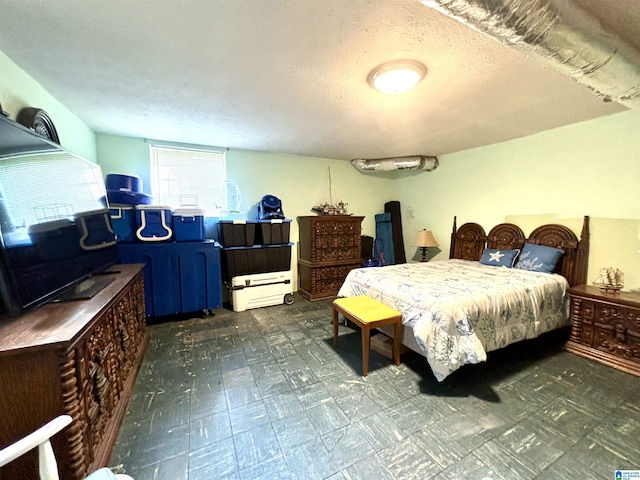 bedroom with a textured ceiling