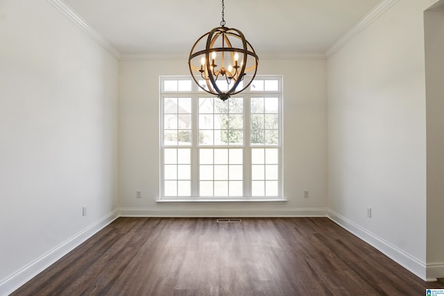 empty room featuring dark hardwood / wood-style floors, an inviting chandelier, and ornamental molding