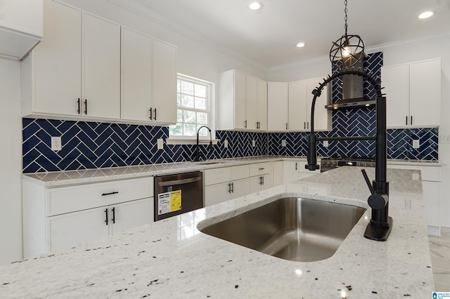 kitchen with crown molding, light stone counters, dishwasher, and pendant lighting