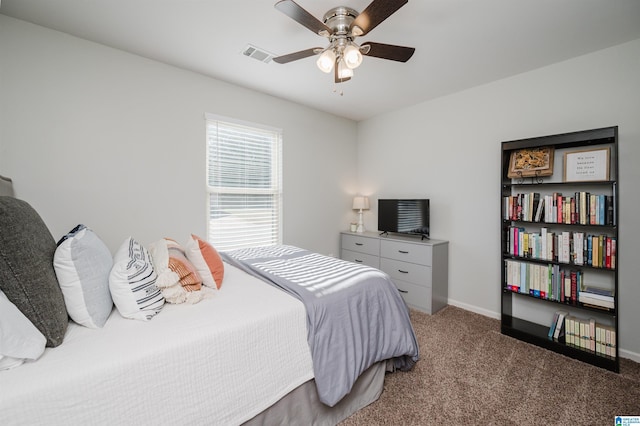 carpeted bedroom featuring ceiling fan