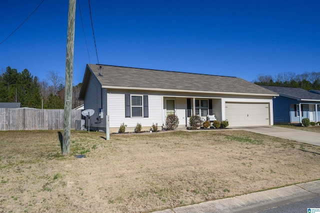 ranch-style home with covered porch, a garage, and central AC