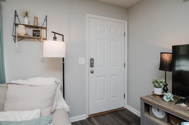 entrance foyer with dark hardwood / wood-style flooring