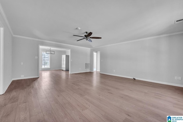 interior space featuring ceiling fan with notable chandelier, light hardwood / wood-style floors, and crown molding