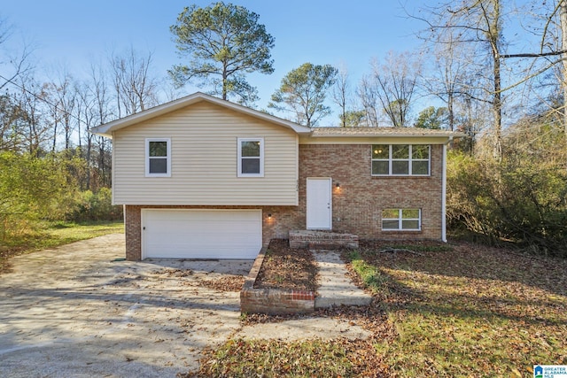 split foyer home featuring a garage