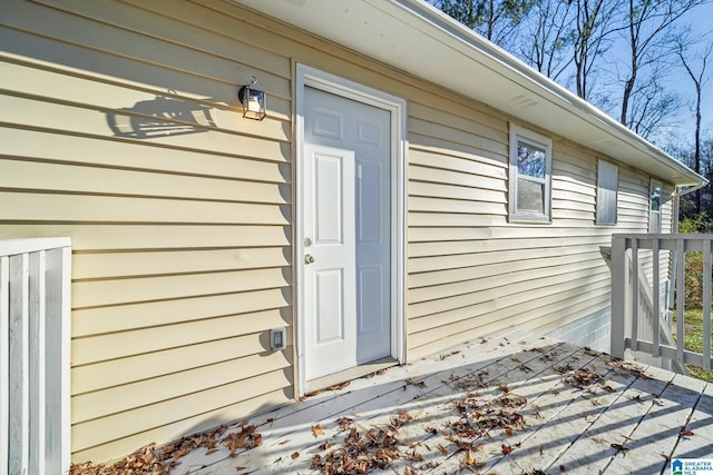 doorway to property featuring a deck