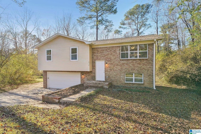 raised ranch featuring a garage