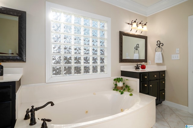 bathroom featuring tile patterned floors, a bathtub, vanity, and ornamental molding