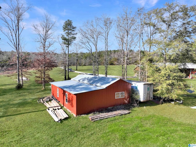 view of outdoor structure featuring a yard