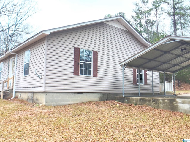55 Jeter Rd, Talladega, AL 35160 - view of property exterior with a carport
