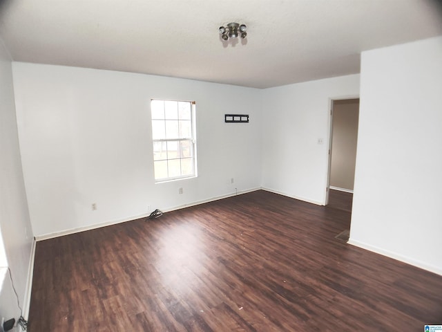 55 Jeter Rd, Talladega, AL 35160 - empty room with dark wood-type flooring