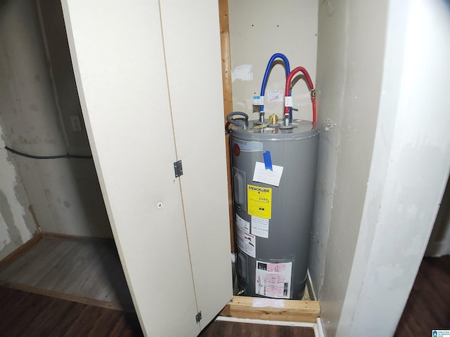55 Jeter Rd, Talladega, AL 35160 - utility room featuring electric water heater