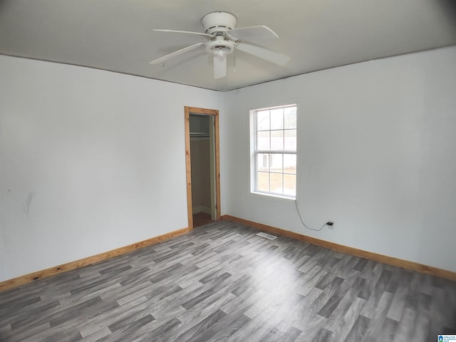 55 Jeter Rd, Talladega, AL 35160 - spare room with wood-type flooring and ceiling fan