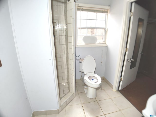 55 Jeter Rd, Talladega, AL 35160 - bathroom featuring tile patterned flooring and toilet
