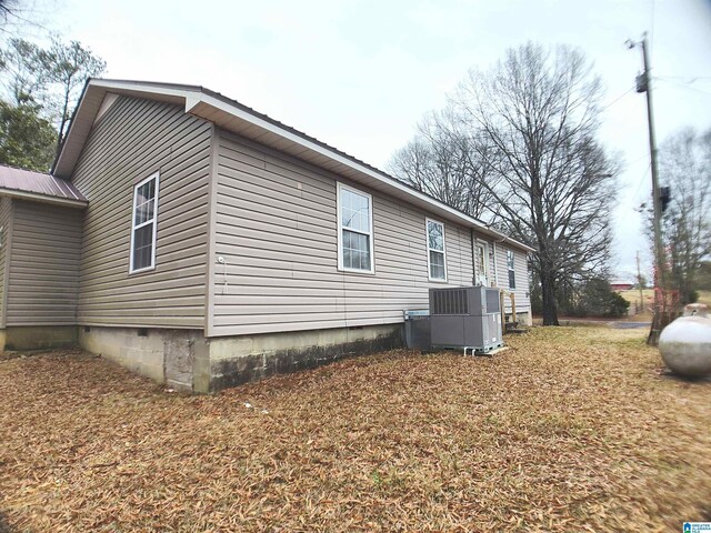 55 Jeter Rd, Talladega, AL 35160 - view of side of home with central AC