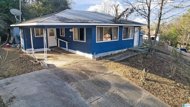 view of front of house featuring a carport