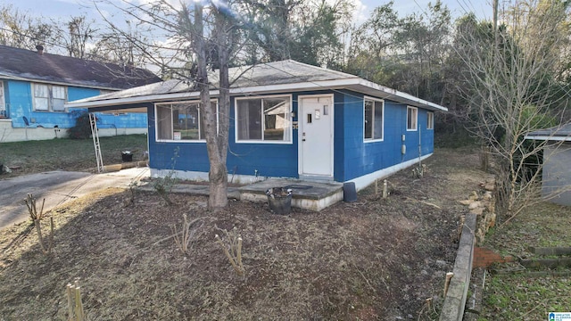 view of front of house featuring a carport