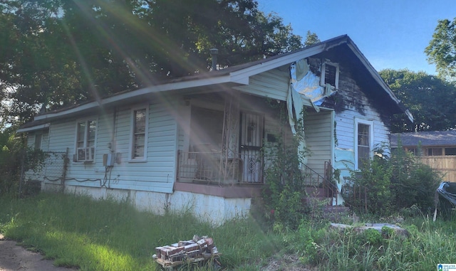 view of home's exterior featuring covered porch