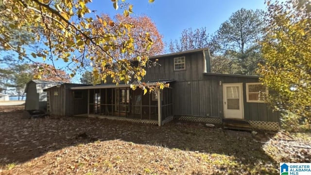 back of property featuring a sunroom