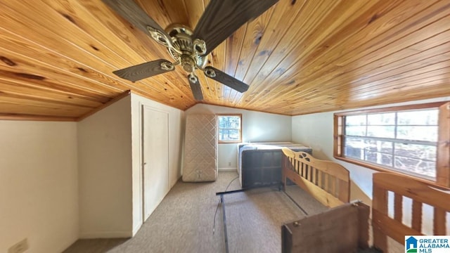 additional living space featuring light colored carpet, ceiling fan, lofted ceiling, and wood ceiling