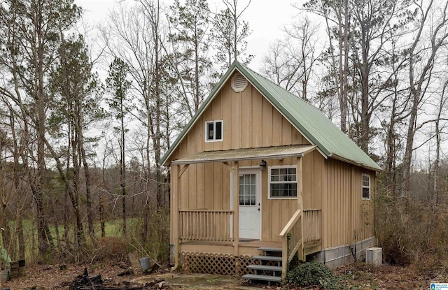 view of outbuilding featuring central air condition unit