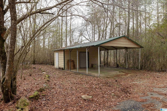 view of outdoor structure with a carport