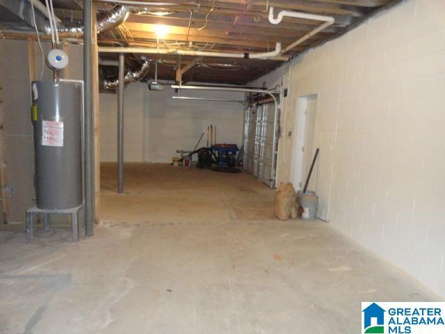 basement featuring water heater