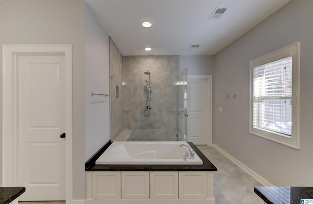 bathroom with plus walk in shower