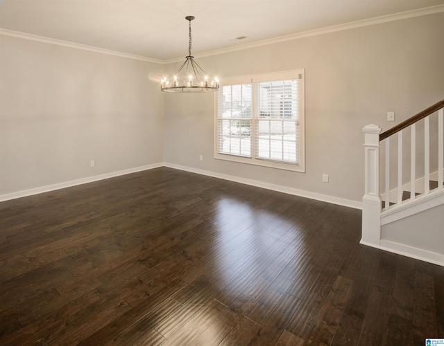 unfurnished room featuring crown molding, dark hardwood / wood-style floors, and a notable chandelier