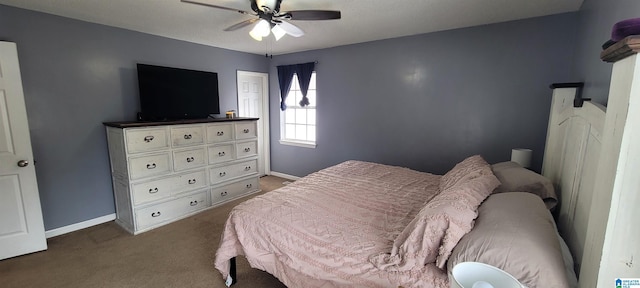 bedroom with ceiling fan and carpet floors