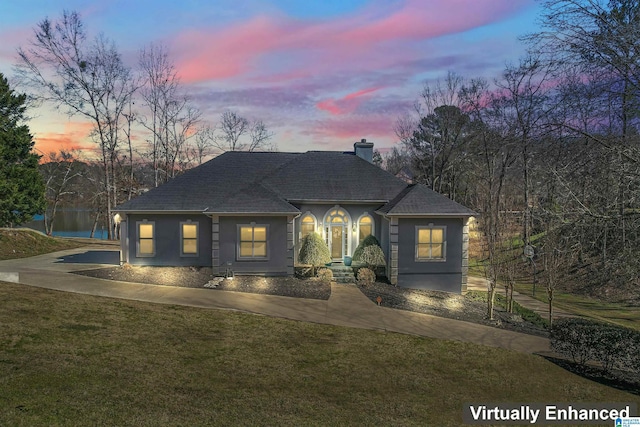 view of front of home featuring a yard