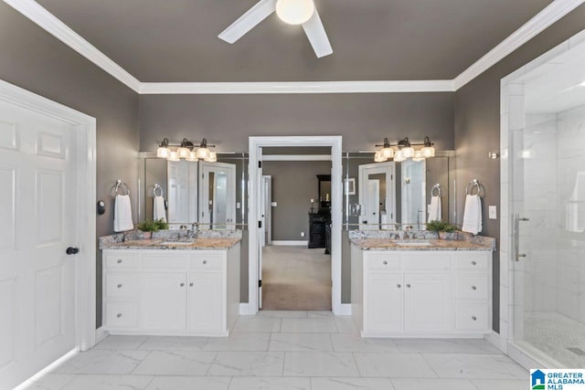 bathroom featuring tiled shower, vanity, ceiling fan, and ornamental molding