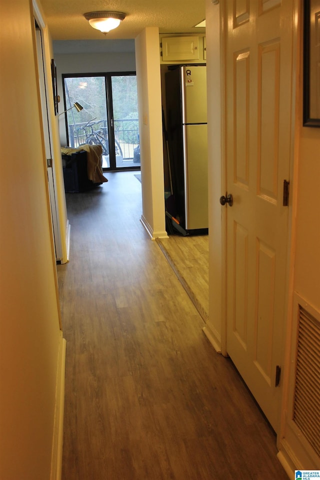 corridor featuring light hardwood / wood-style flooring