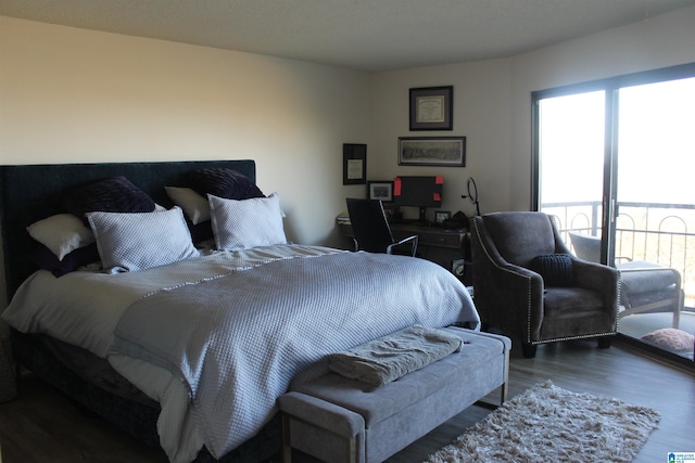 bedroom featuring dark hardwood / wood-style flooring