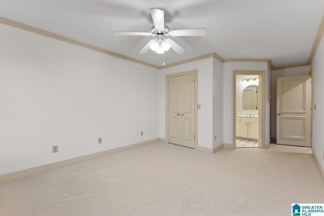 unfurnished bedroom with a closet, light carpet, crown molding, and ceiling fan