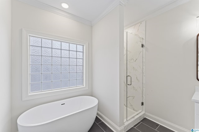 bathroom featuring tile patterned flooring, ornamental molding, and independent shower and bath