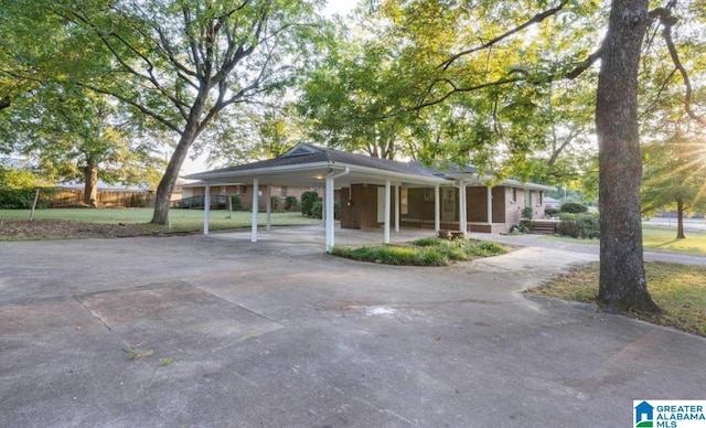 view of home's community with a carport