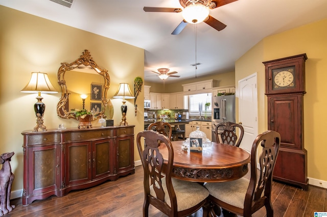 dining room with dark hardwood / wood-style floors and ceiling fan