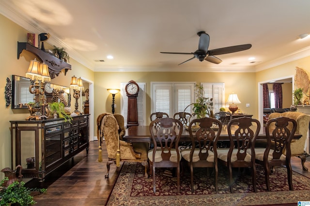 dining space with ceiling fan, crown molding, and dark wood-type flooring