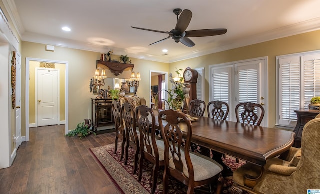 dining room featuring crown molding, dark hardwood / wood-style flooring, and ceiling fan with notable chandelier