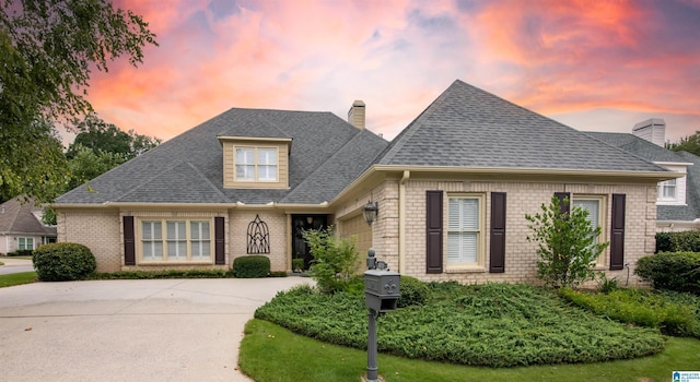 view of front of property featuring a garage