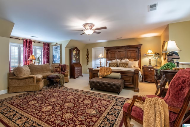 carpeted bedroom featuring ceiling fan