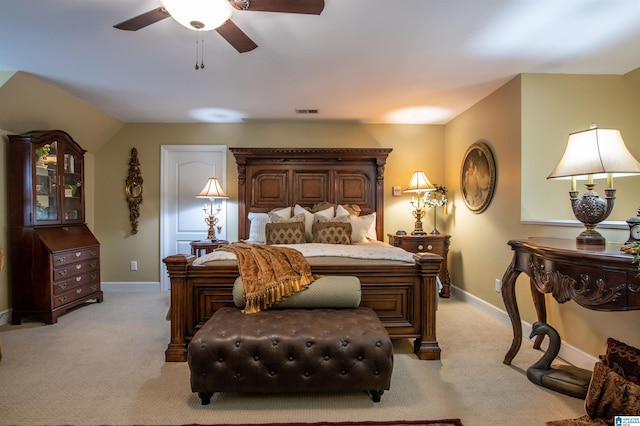 bedroom with light carpet and ceiling fan