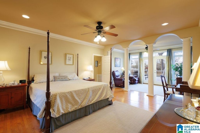 bedroom featuring access to exterior, light hardwood / wood-style floors, ceiling fan, and ornamental molding