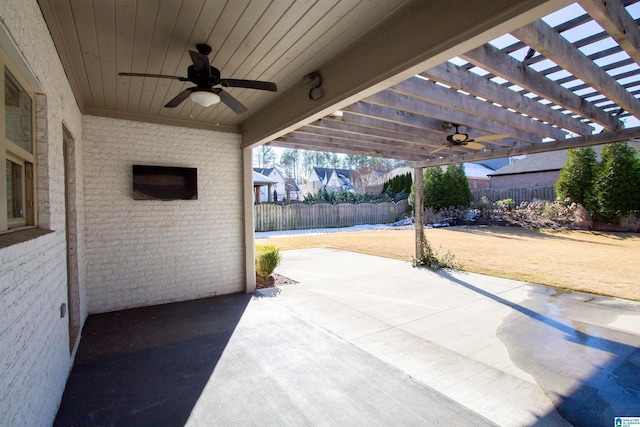 view of patio / terrace featuring a pergola and ceiling fan