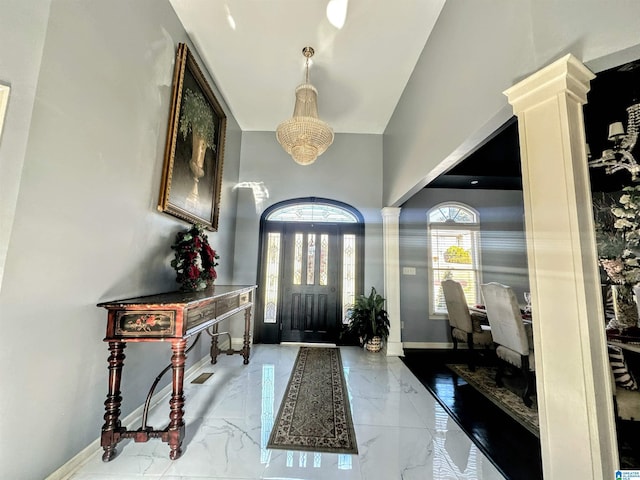 foyer featuring ornate columns