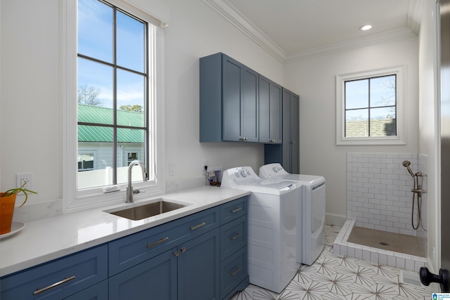 laundry room with independent washer and dryer, light tile patterned floors, cabinets, crown molding, and sink