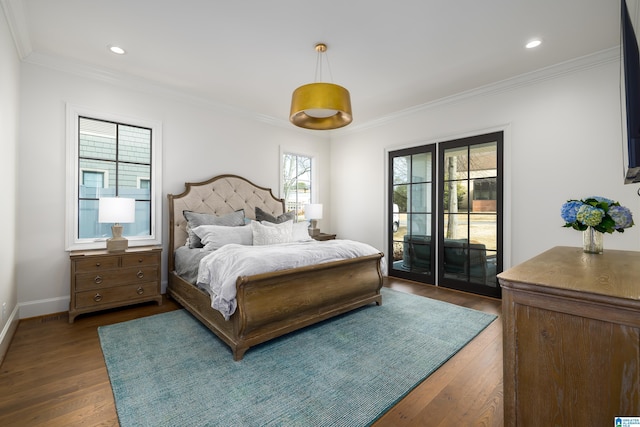 bedroom with ornamental molding, dark hardwood / wood-style floors, and access to exterior