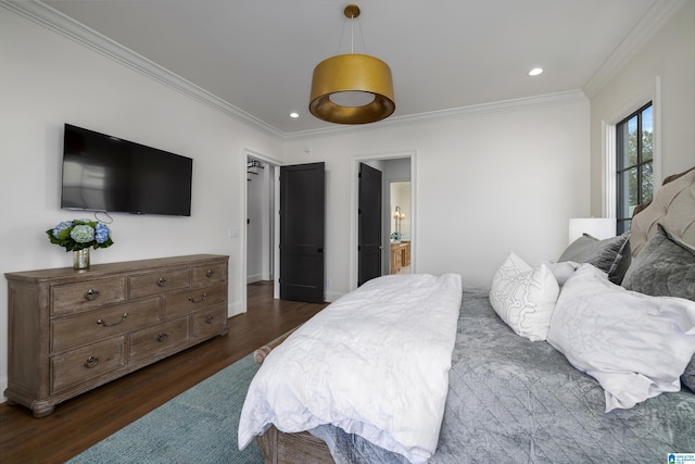 bedroom featuring ornamental molding and dark hardwood / wood-style flooring