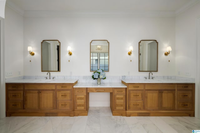 bathroom featuring ornamental molding, a notable chandelier, and vanity